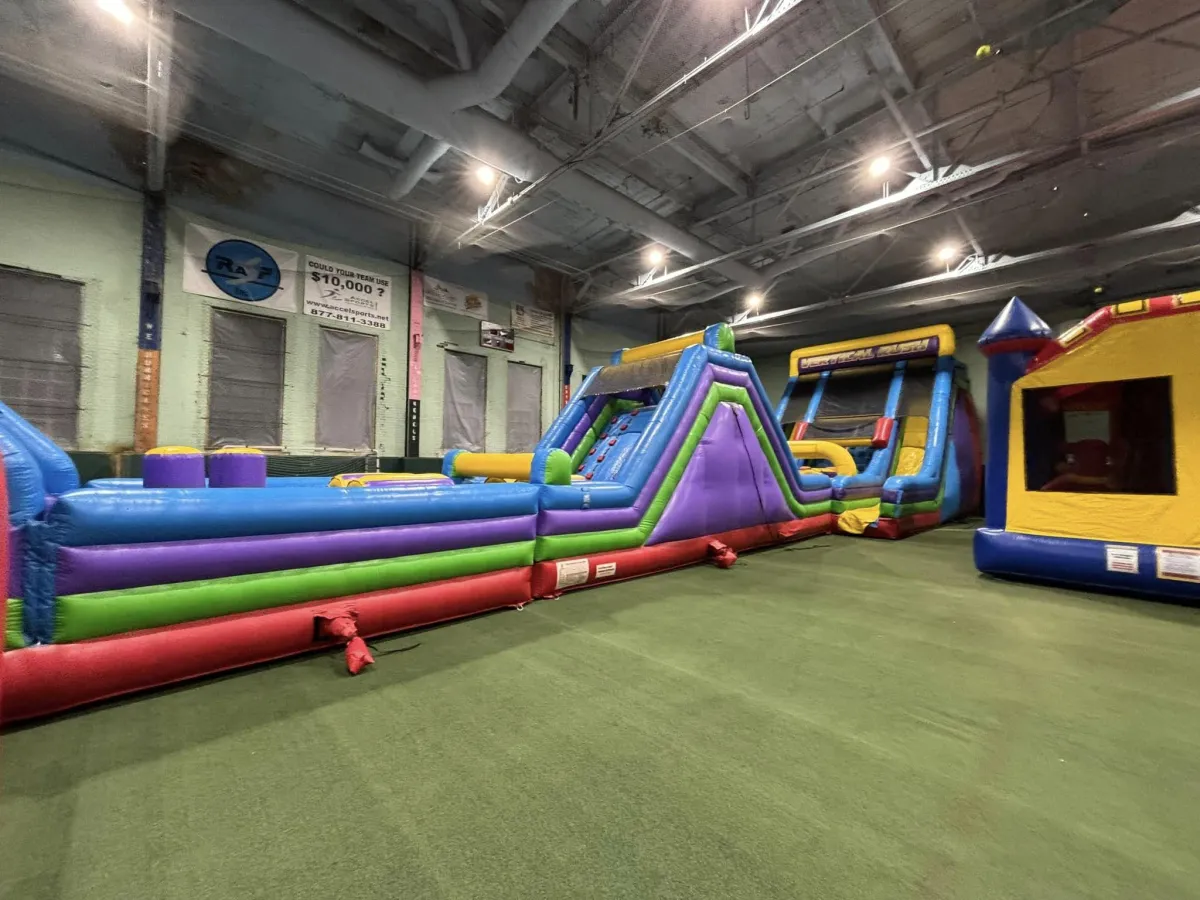 Kids enjoying inflatables at ADK Bounce-A-Palooza